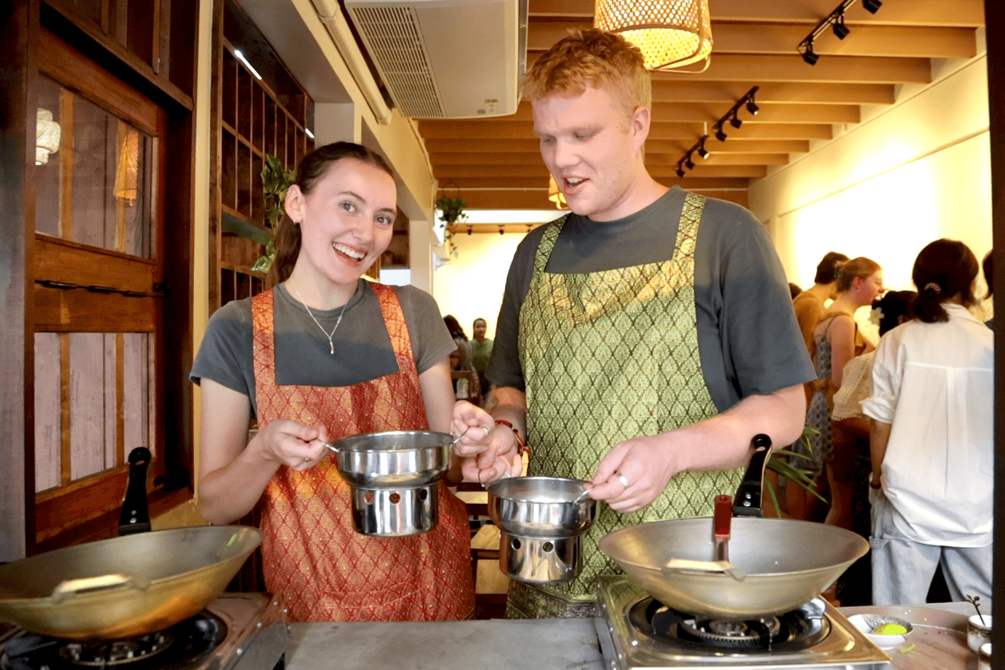 Students mastering Thai cuisine